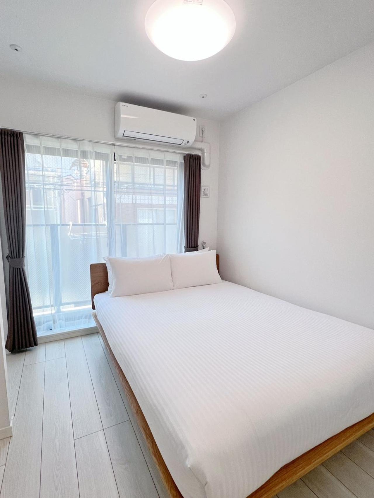 Real Okubo Apartment Hotel Tokio Buitenkant foto